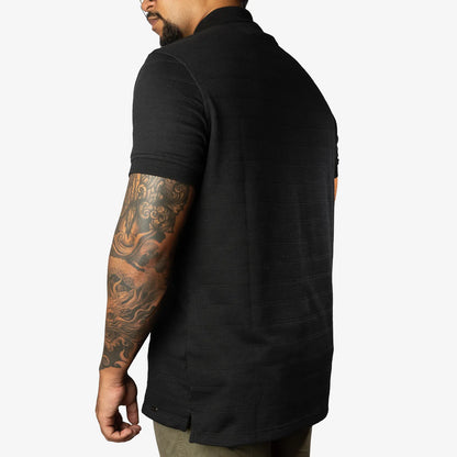 Camiseta polo manga corta negro texturizada